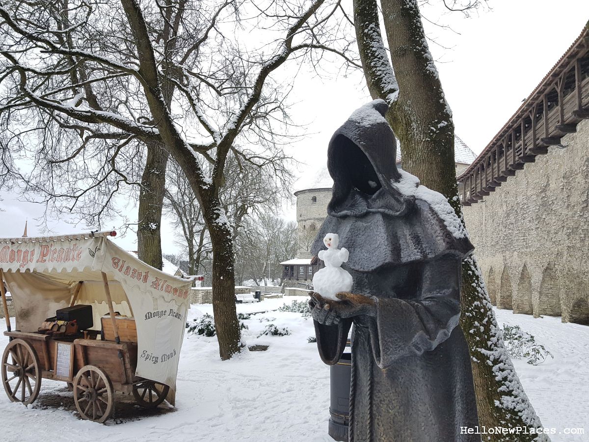 monk-holding-snowman-in-tallinn-old-town